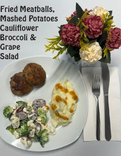 Fried Meatballs, Mashed Potatoes, Cauliflower, Broccoli & Grape Salad